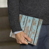 A business man holds Personalized VistaCase reMarkable Pen Holder Case with Wood design