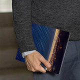 A business man holds Personalized VistaCase reMarkable Pen Holder Case with Starry Night design